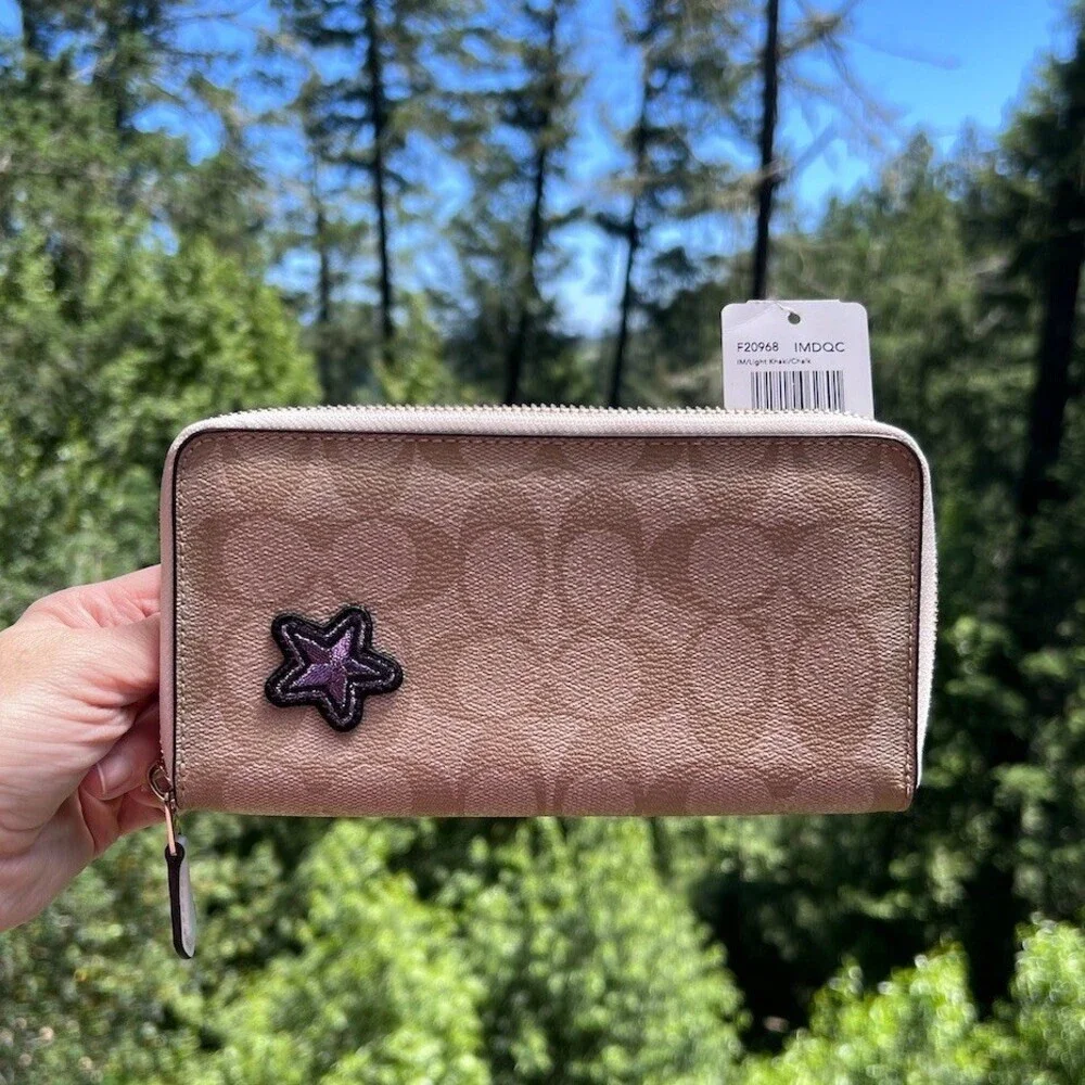 Coach accordion zip